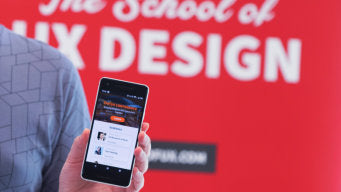 The School of UX, testing mobile UI prototype created by students at the workshop